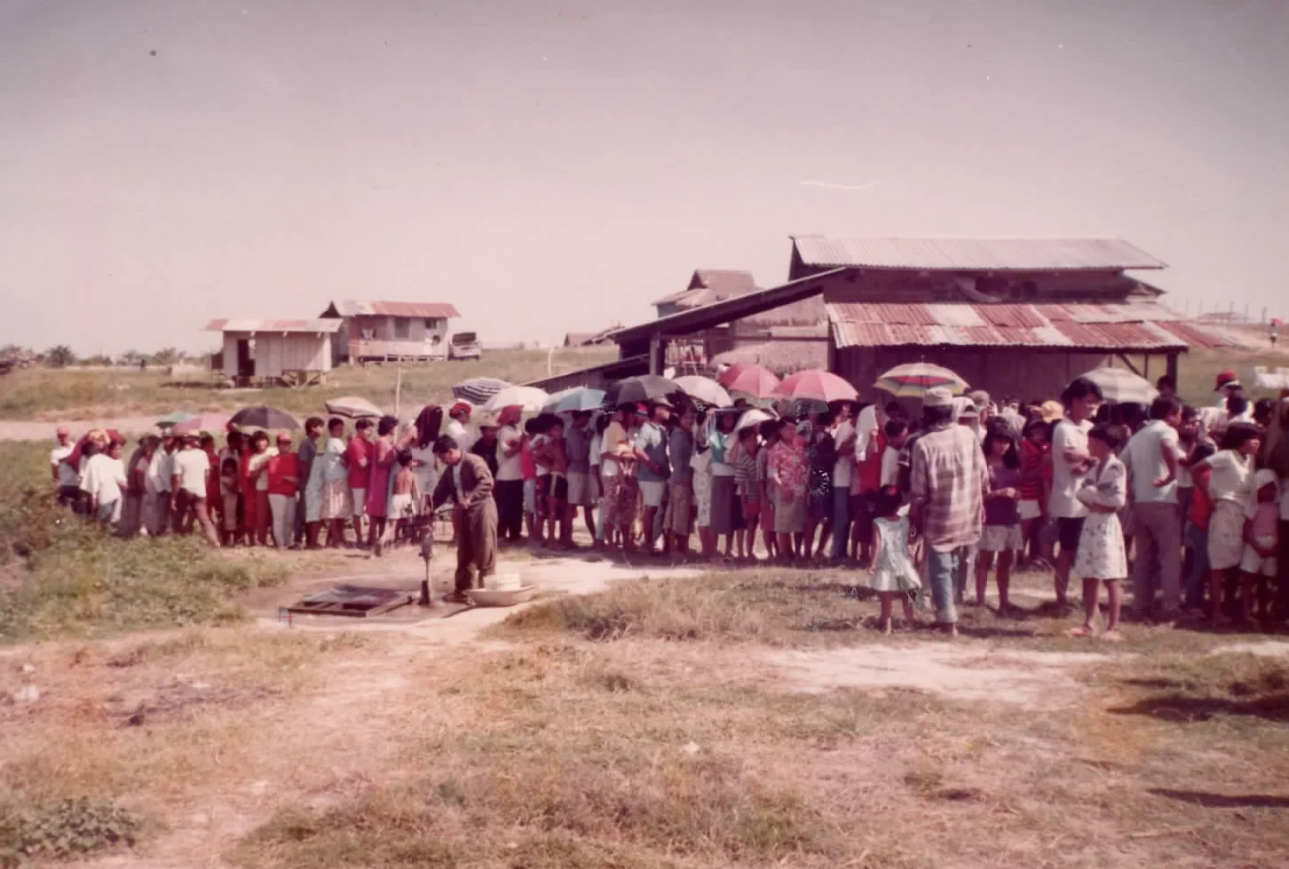 Community members lined up for a medical and relief mission